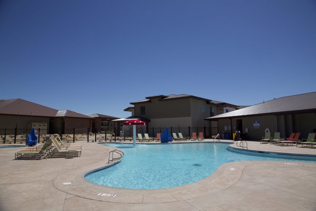 A commercial in-ground gunite pool installed for Fairfield Inn and Suites by Marriott near Washington, Ut