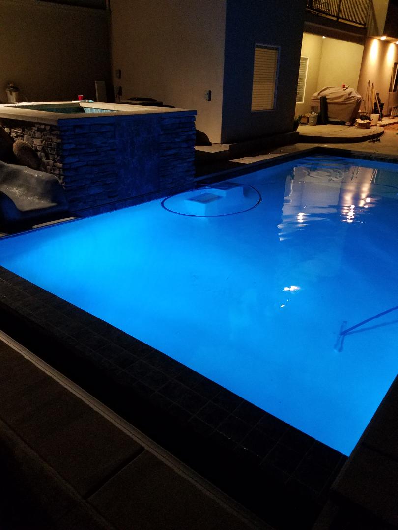 The addition of underwater lighting in this Hurricane Utah swimming pool makes the night swimming experience fun.