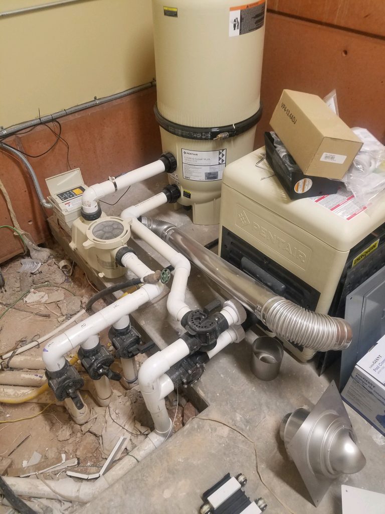 Pump and heater station for swimming pool in Washington, Ut.