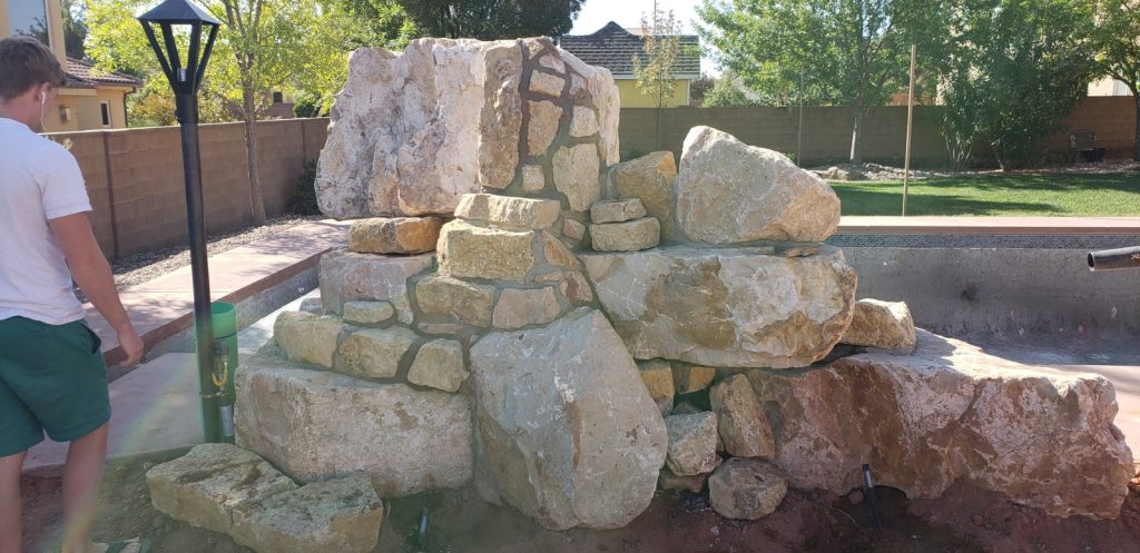 Rock water feature made with real stone for a home in Hurricane Ut.