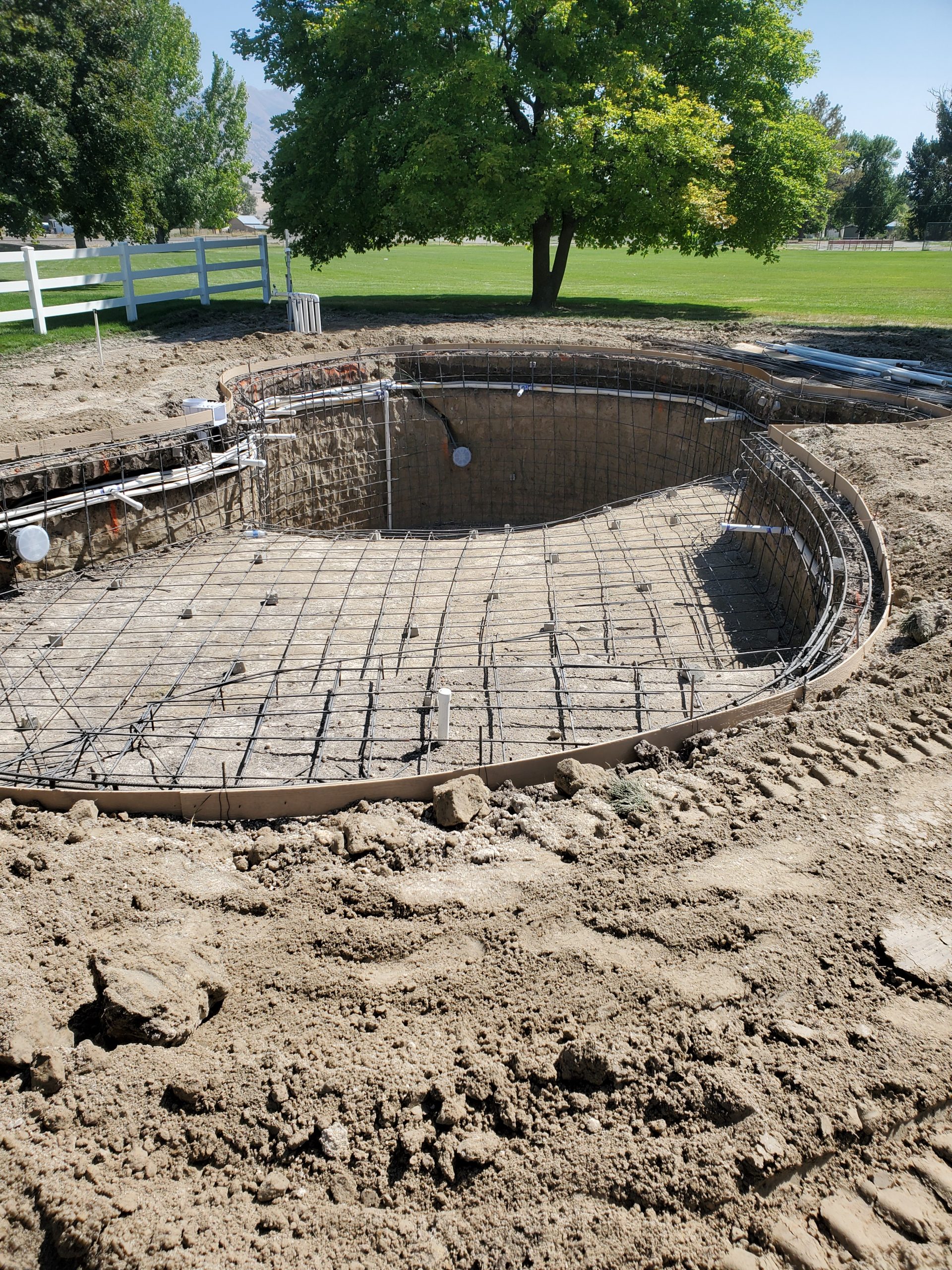 Custom oval shape in ground swimming pool rebar in Tremonton Ut