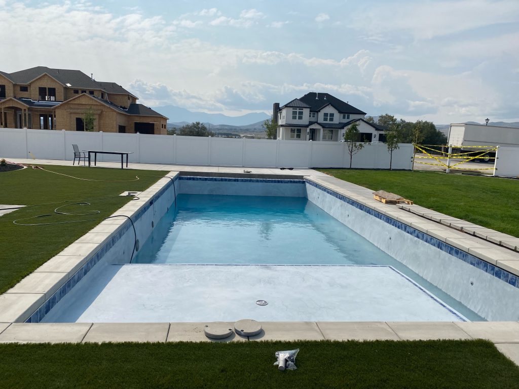 Completed in ground swimming pool in Northern Utah near Tremonton, Ut provided by GTD construction